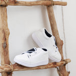White Sneakers with Black Band